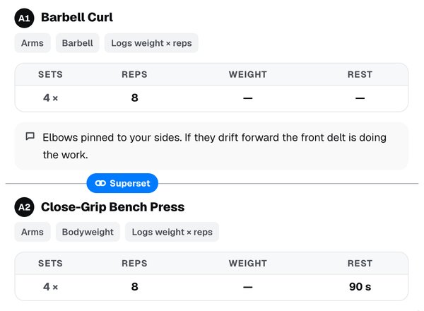 Two exercises joined by a Superset link in the workout editor